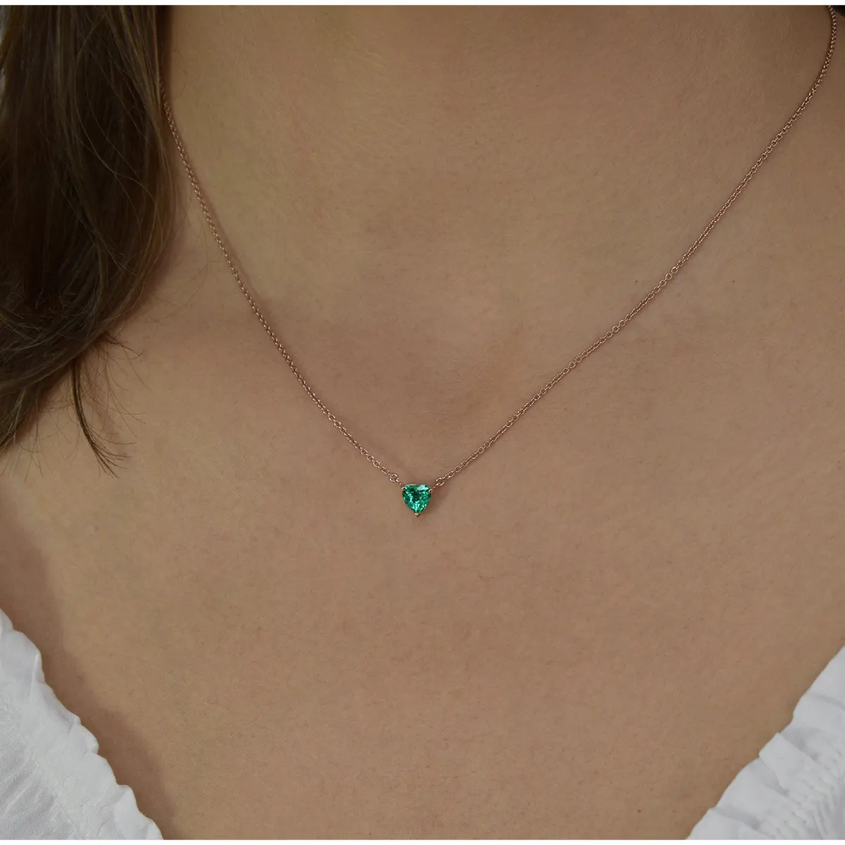 AAA_emerald_necklace_in_rose_gold.webp