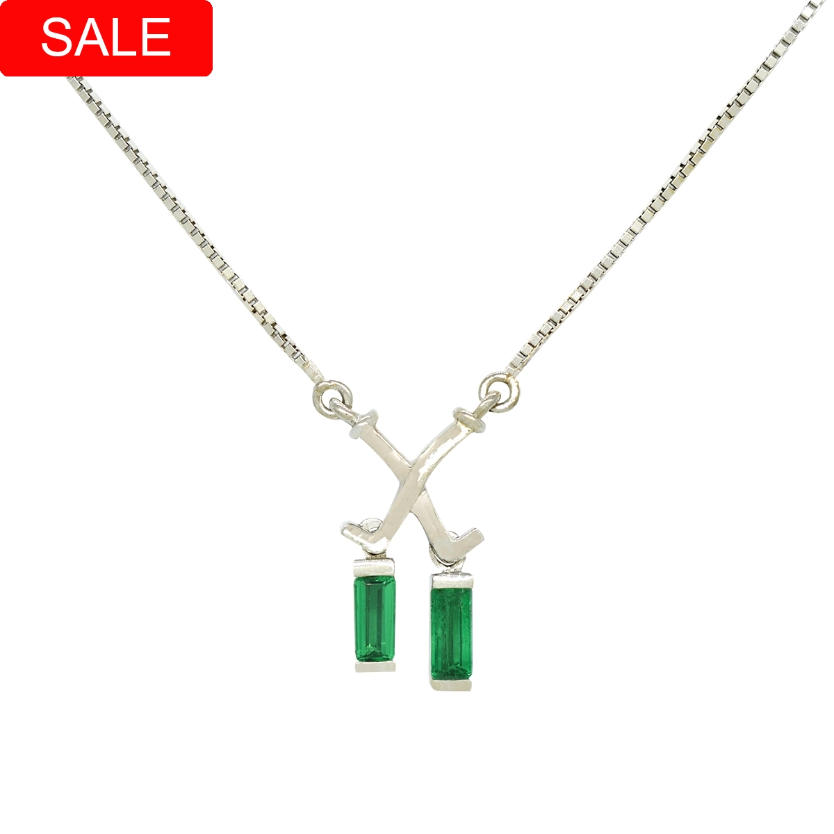 Emerald necklace in 18K white gold with 2 baguette cut natural Colombian emeralds in 1.04 Ct. t.w. set in half bezel setting