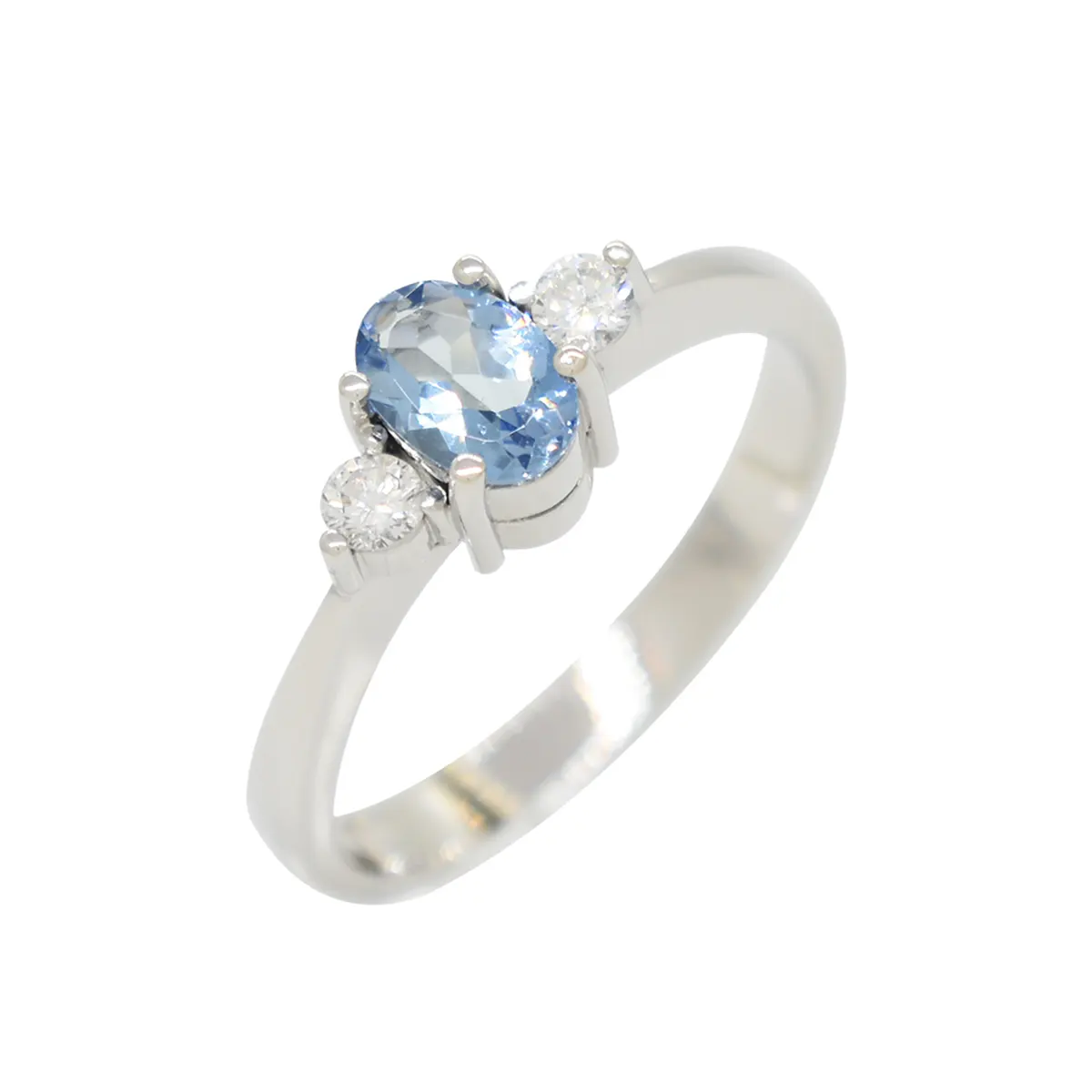 Small 3 stones ring with genuine oval shape natural aquamarine in 0.38 Ct. in the middle of 2 round cut diamonds in 0.12 Ct. total weight