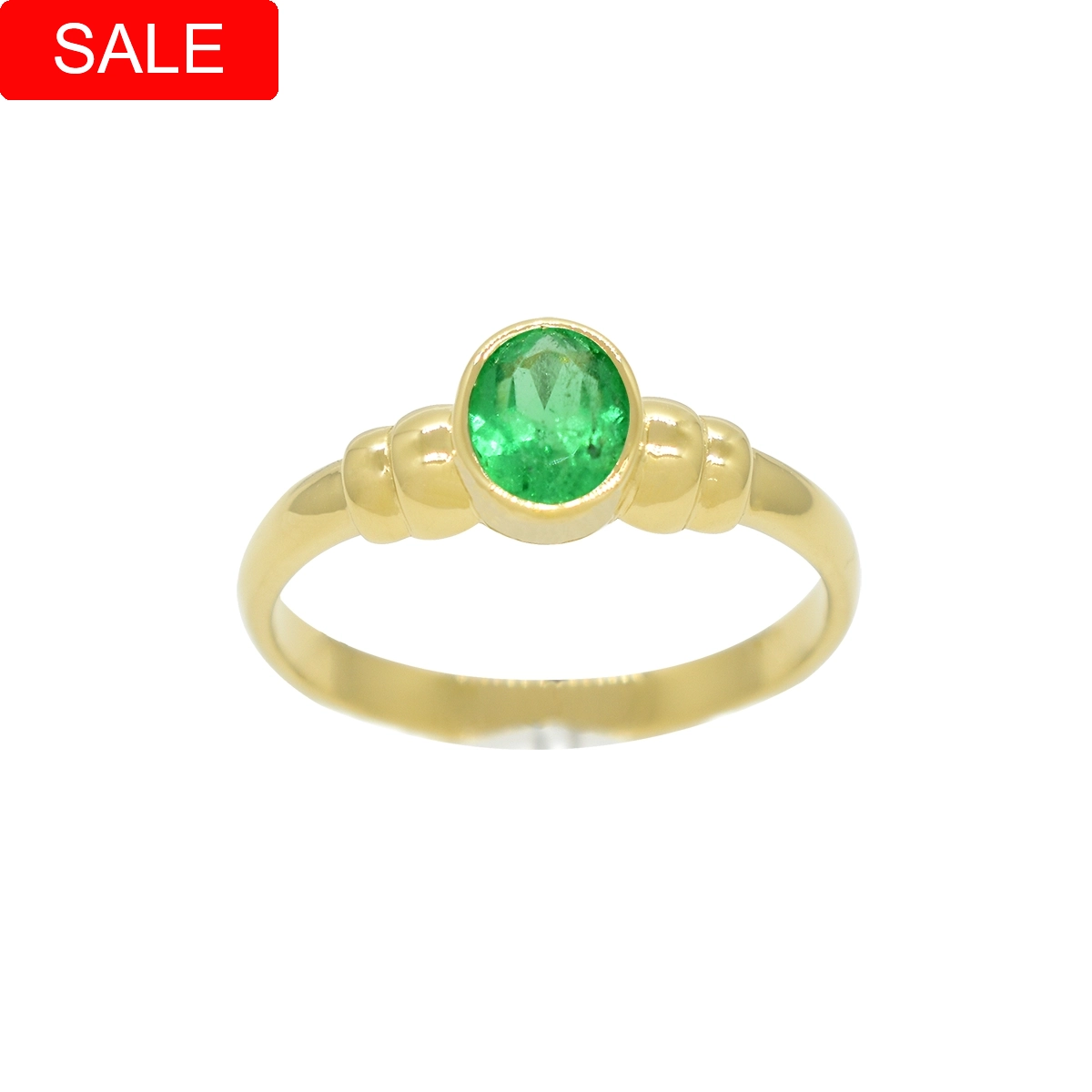 Solitaire emerald ring custom made in 18K yellow gold with green brilliant color natural Colombian emerald as its centerpiece