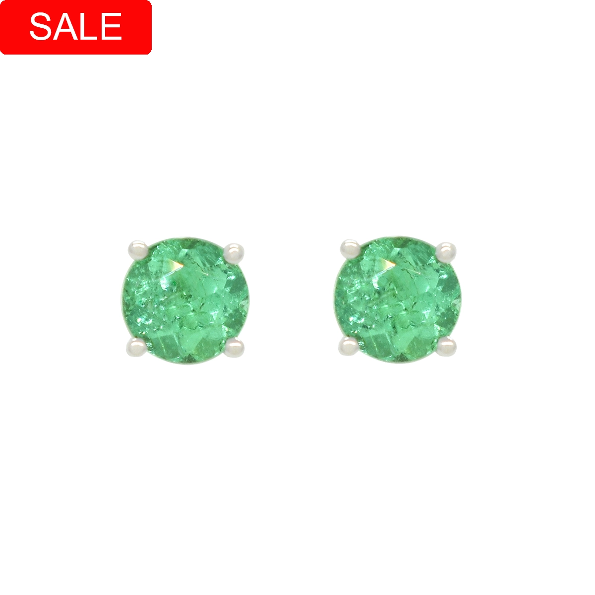 Round stud earrings with two beautiful natural Colombian emeralds in a stunning medium green color beautifully set in a solid 18K white gold setting