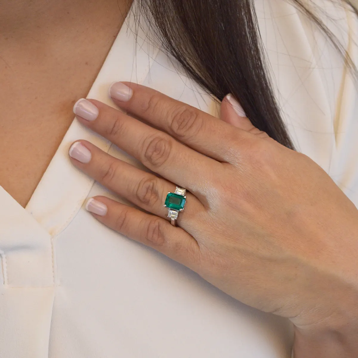 big_high_quality_emerald_cut_emerald_ring_white_gold.webp