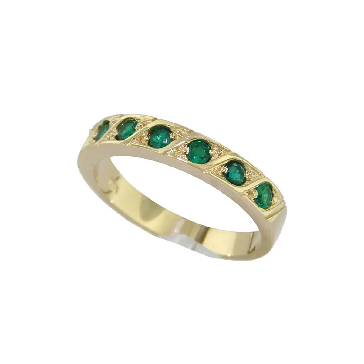 The band of the ring is smoothly polished and has a comfortable fit, designed to be worn every day. It features a timeless design that highlights the emeralds.