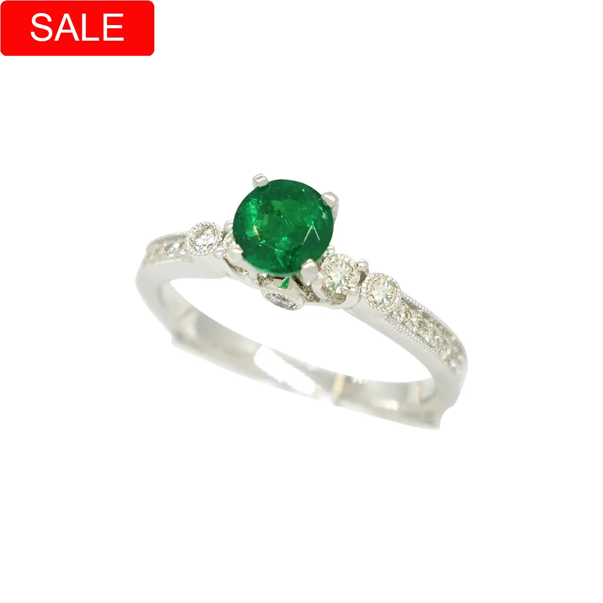 Fine white gold emerald and diamond ring with 0.50 Ct. excellent quality natural Colombian emerald set in prongs and 20 round cut diamonds in 0.39 Ct. t.w. in pave