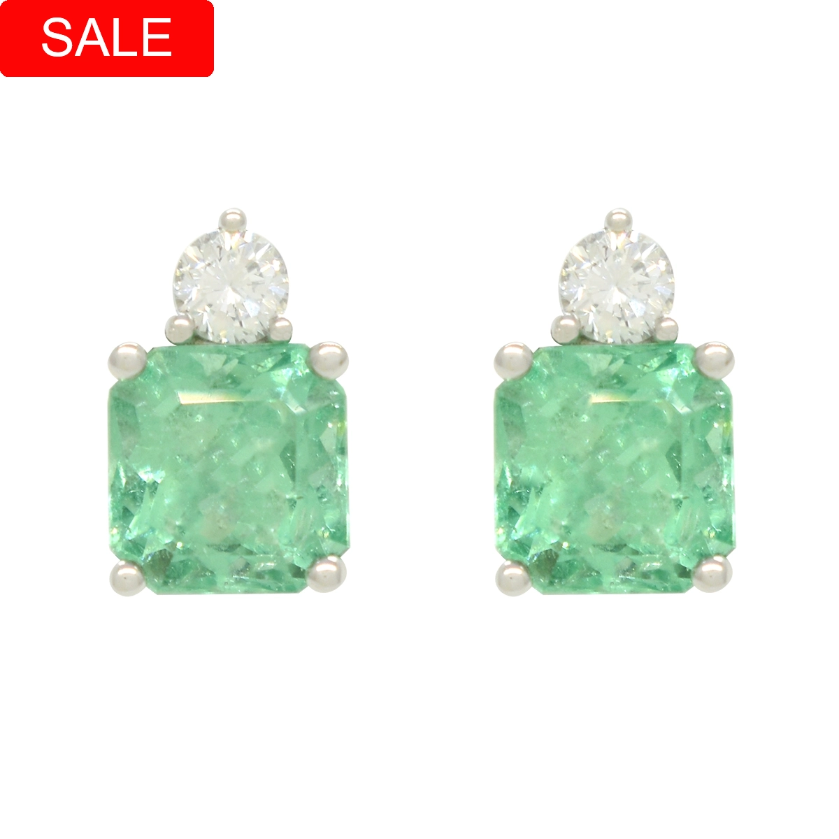 Emerald and diamond stud earrings custom made in 18K white gold with 2.26 Ct. t.w. in 2 stunning emerald-cut natural emeralds and 0.20 Ct. t.w. in 2 round-cut genuine diamonds