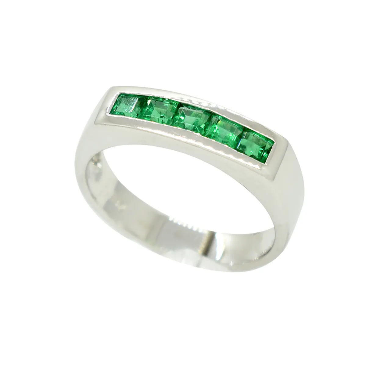 This is a stunning 18K white gold ring featuring 5 green emeralds set in a channel setting, totaling 0.56 carats