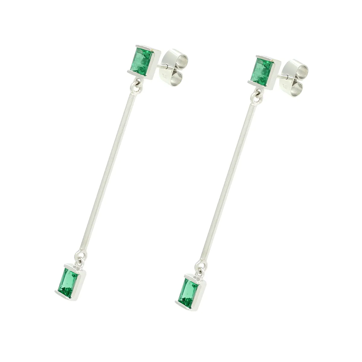 These dangling emerald earrings have a small emerald cut emerald at the top and one of the bottom in half bezel setting joined by a fine long white gold pole on each earring