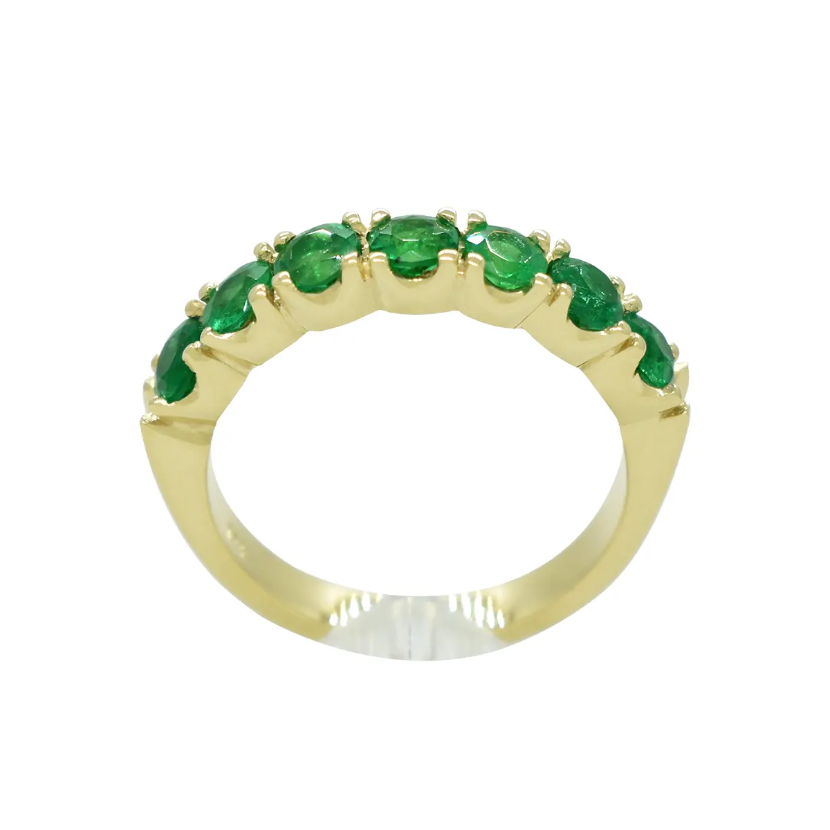 Half eternity emerald wedding band ring. The smooth gold sides create a smooth, comfortable feeling between the fingers and a better fit than complete eternity bands