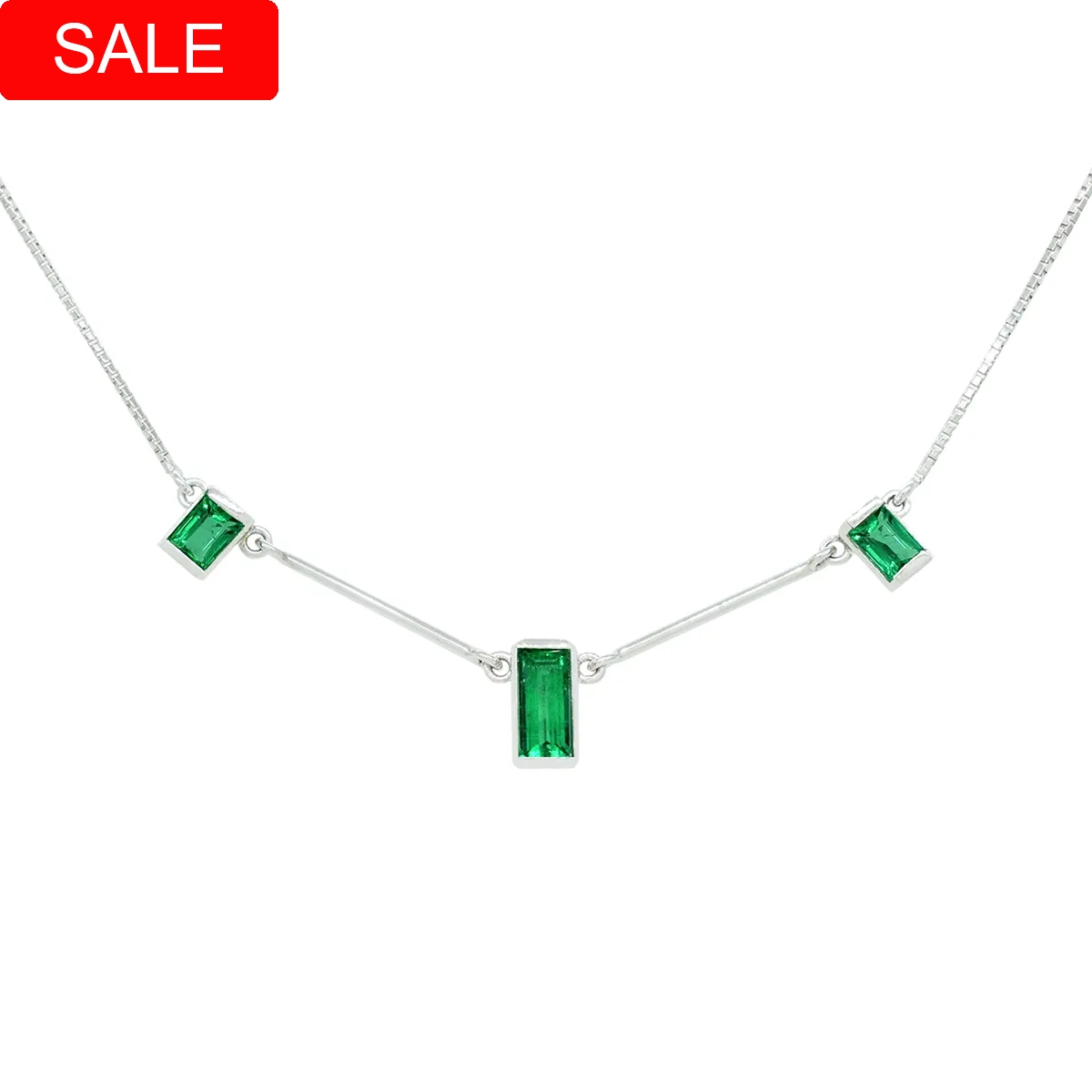 Emerald necklace in 18K white gold with 1.02 Ct. total weight in 3 small emerald cut natural Colombian emeralds in excellent quality, dark and brilliant green color with transparent interior