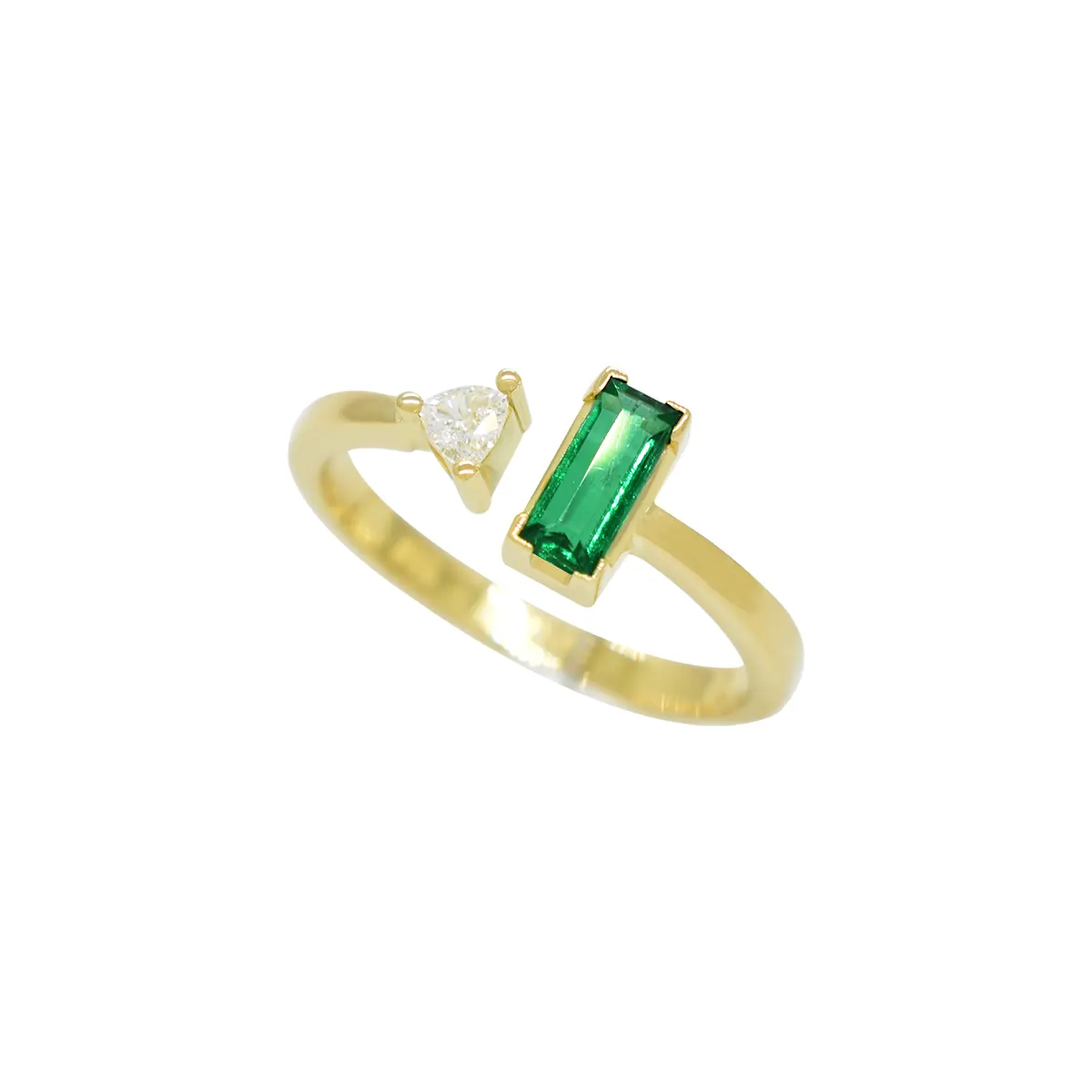 The emerald and diamond ring design features a cuff-like structure with an open center. This detail adds a modern and unique touch to the gemstone ring