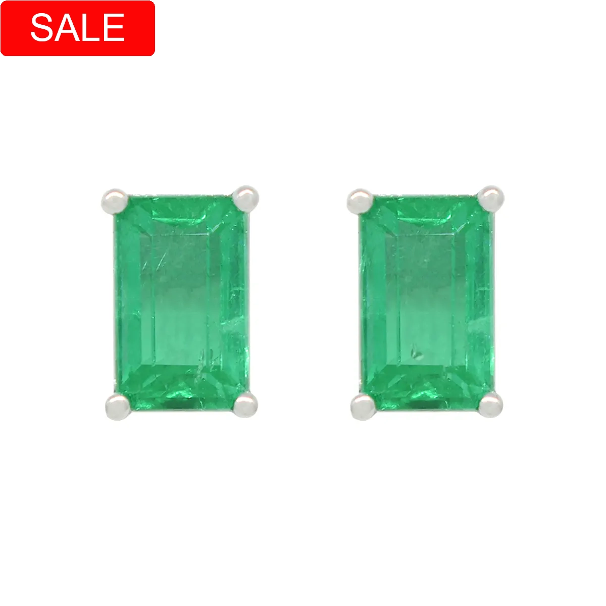 Emerald cut natural Colombian emeralds set in 18K white gold stud earrings in classic 4 prongs minimalist style