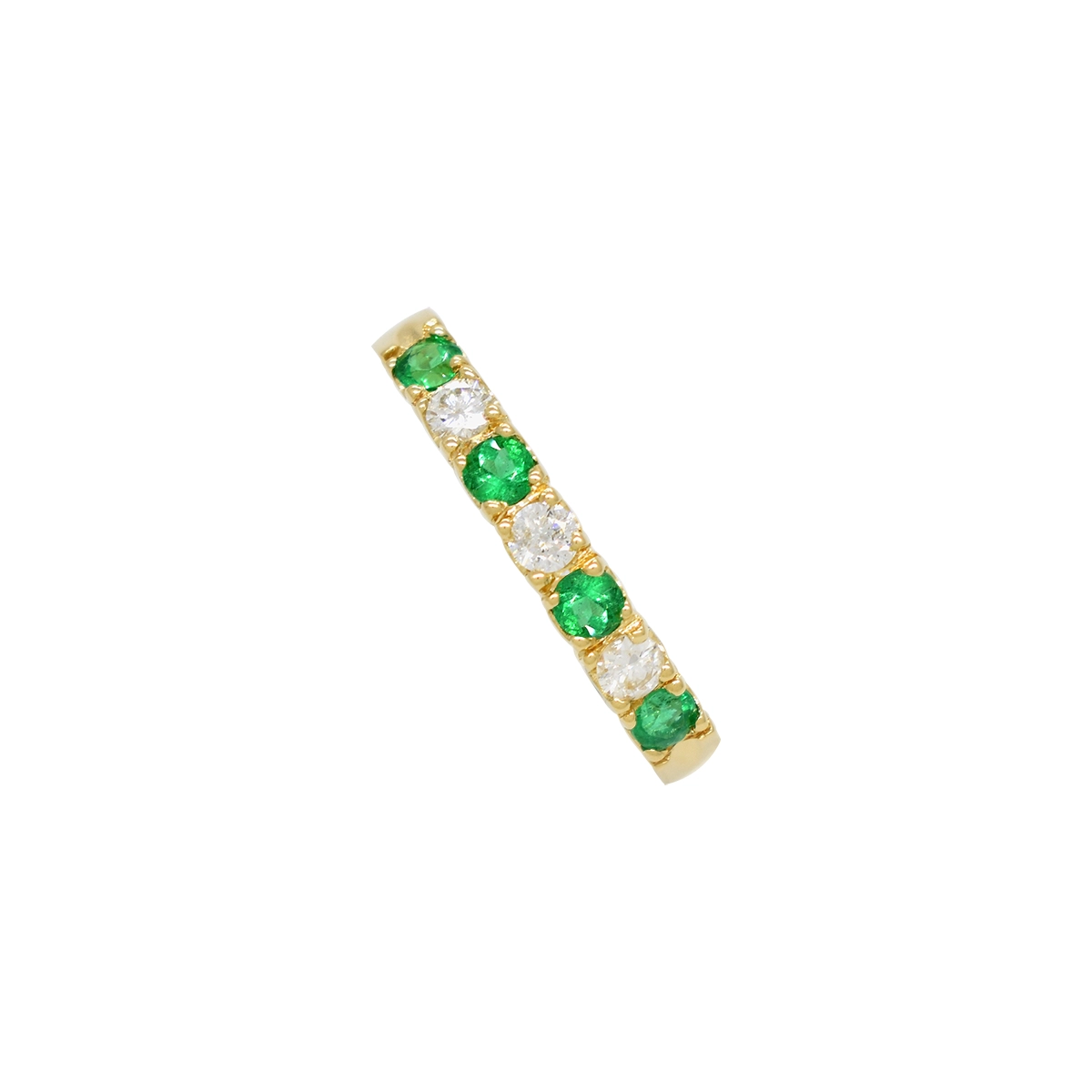 This wedding band ring features round cut emeralds and diamonds that are 2.6 millimeters in diameter, the band is 3 millimeters wide