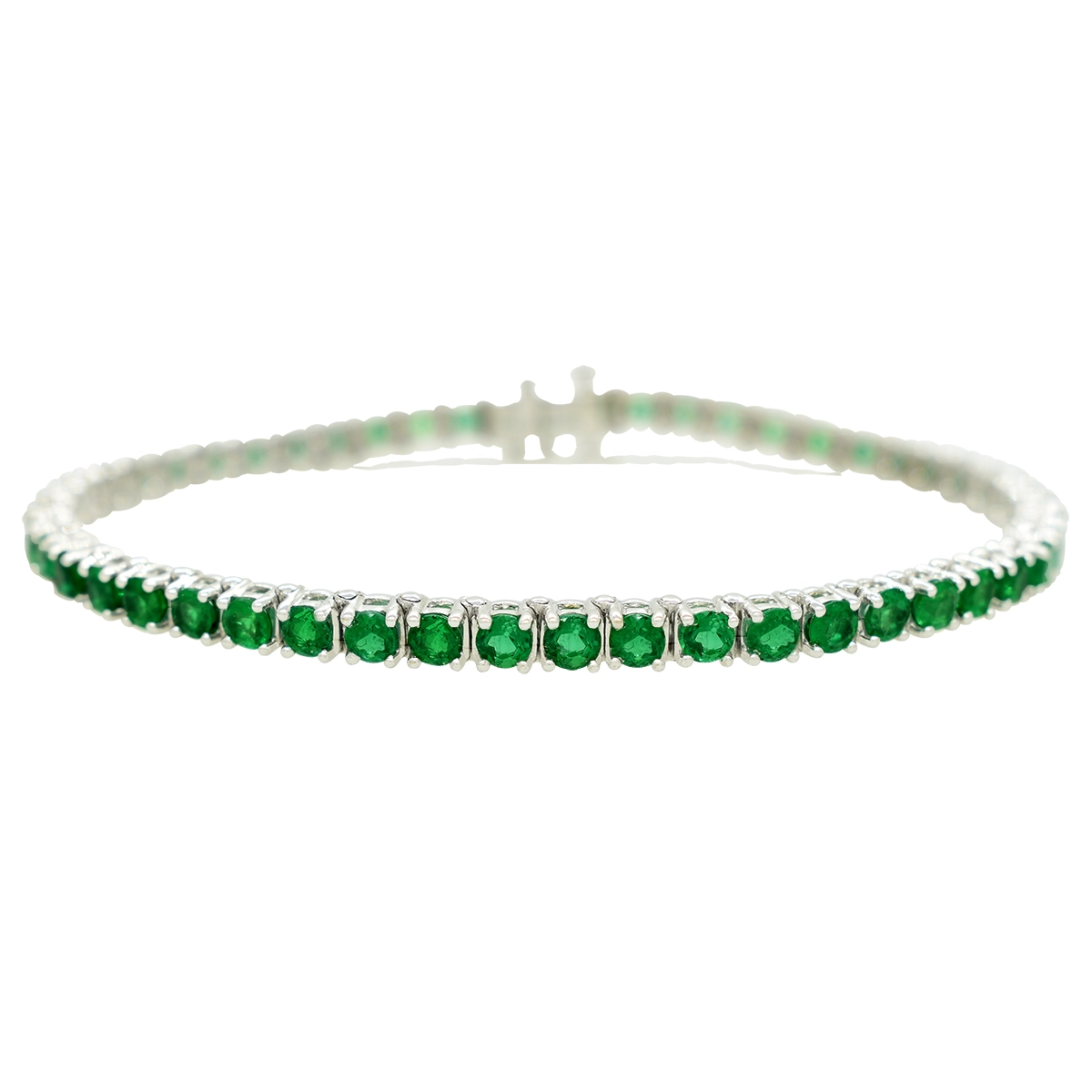 Tennis emerald bracelet with 5.25 Ct. t.w in 51 round cut natural Colombian emeralds set in solid 18K white gold classic 4 prongs setting