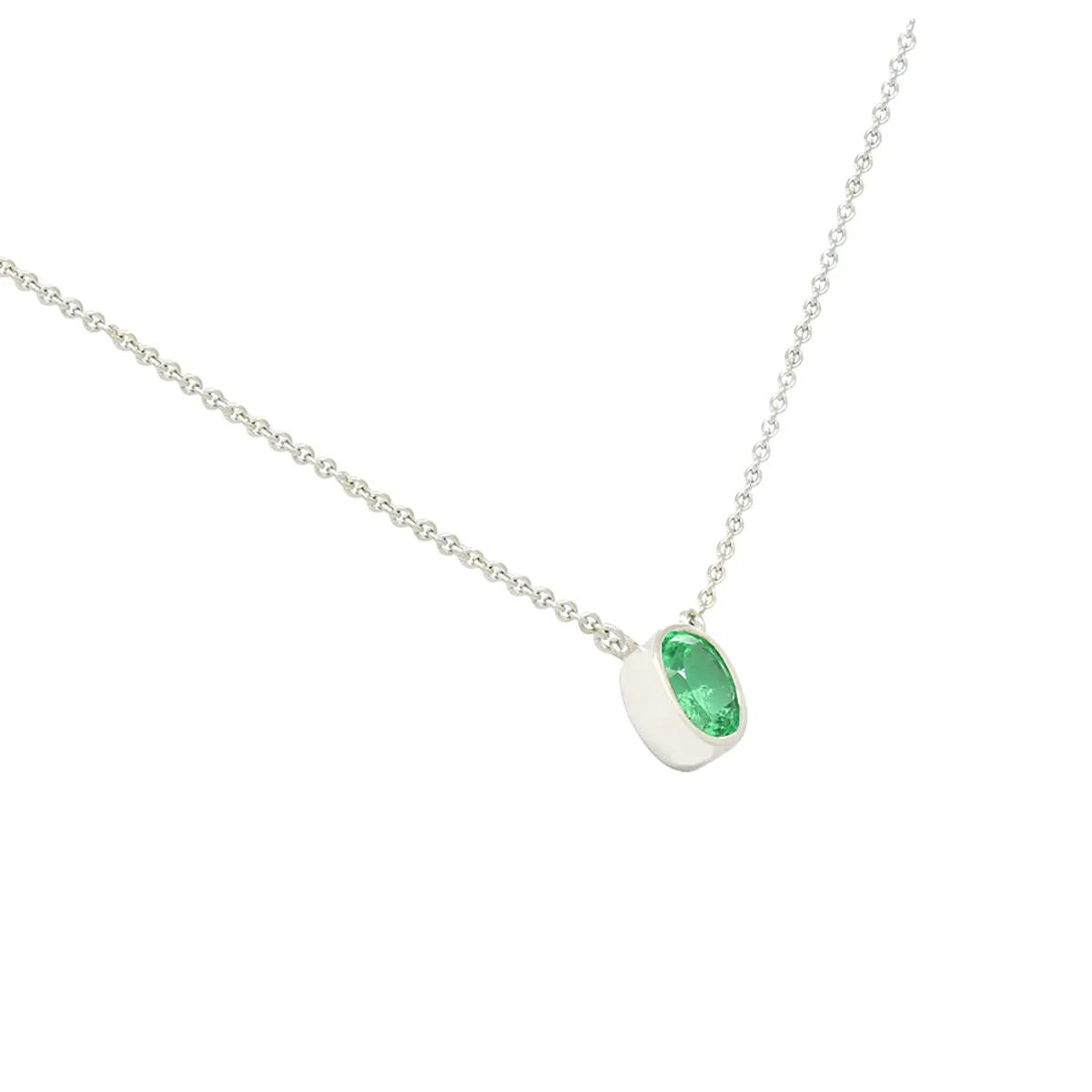 simple_emerald_necklace_white_gold_bezel_setting.webp