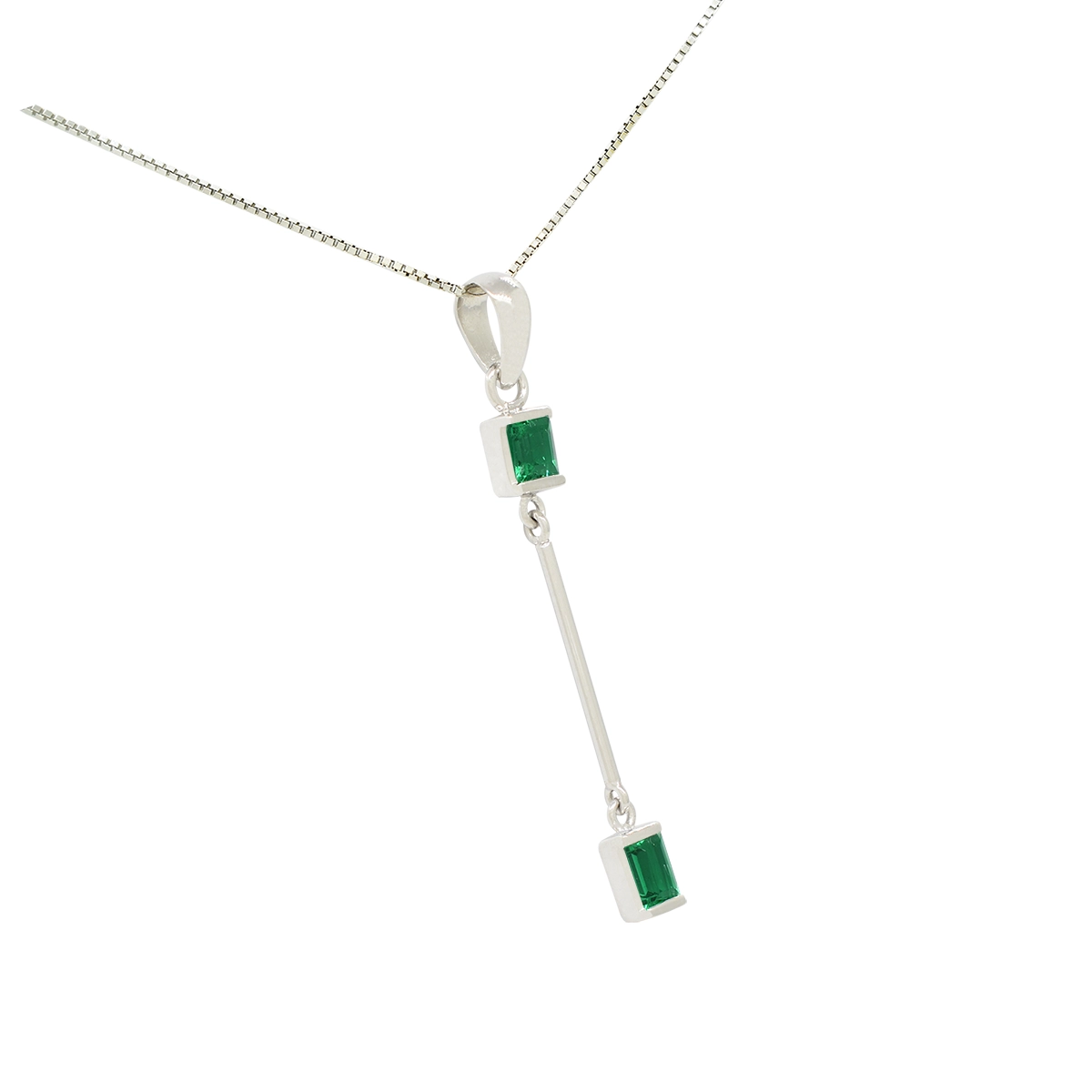 Delicate emerald pendant necklace with a feminine and minimalist style with 2 small rectangular emeralds in excellent quality that show their deep and vivid green color beautifully