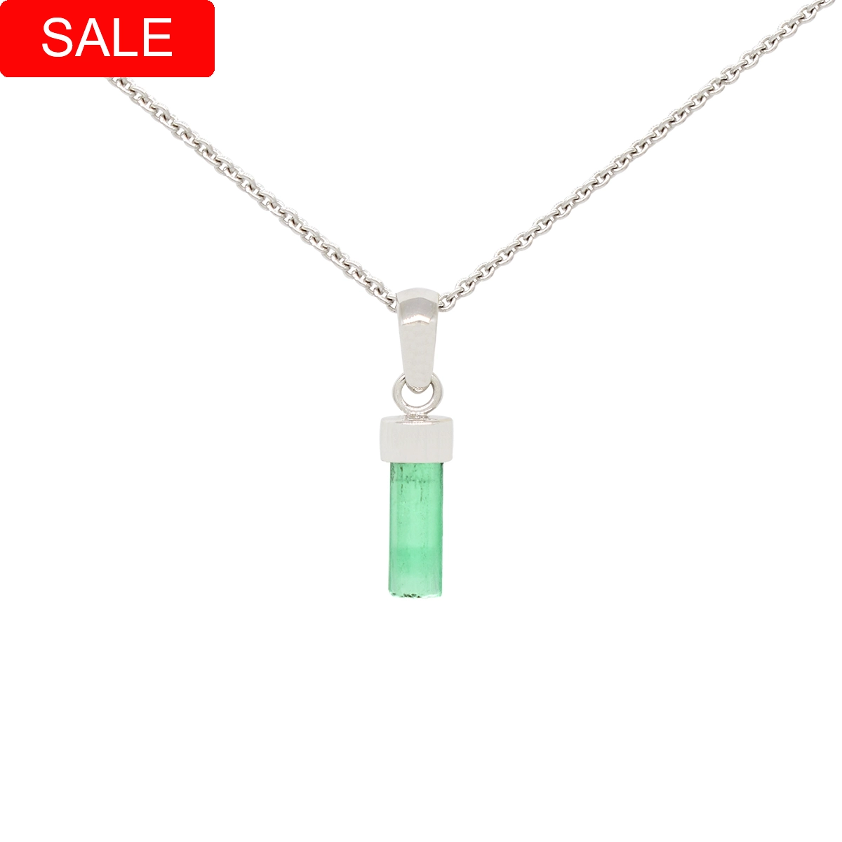 Emerald pendant in 18K white gold with 0.75 Ct. uncut genuine natural Colombian emerald in its raw stage with light green color