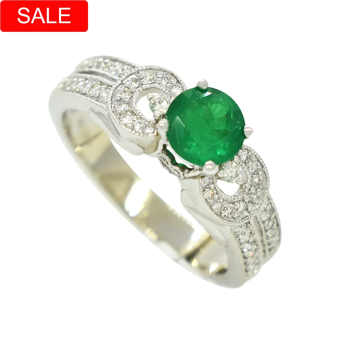 Emerald ring with diamond accents in 14K white gold with 0.67 Ct. natural Colombian emerald and 0.31 Ct. t.w. in 44 round cut small diamonds