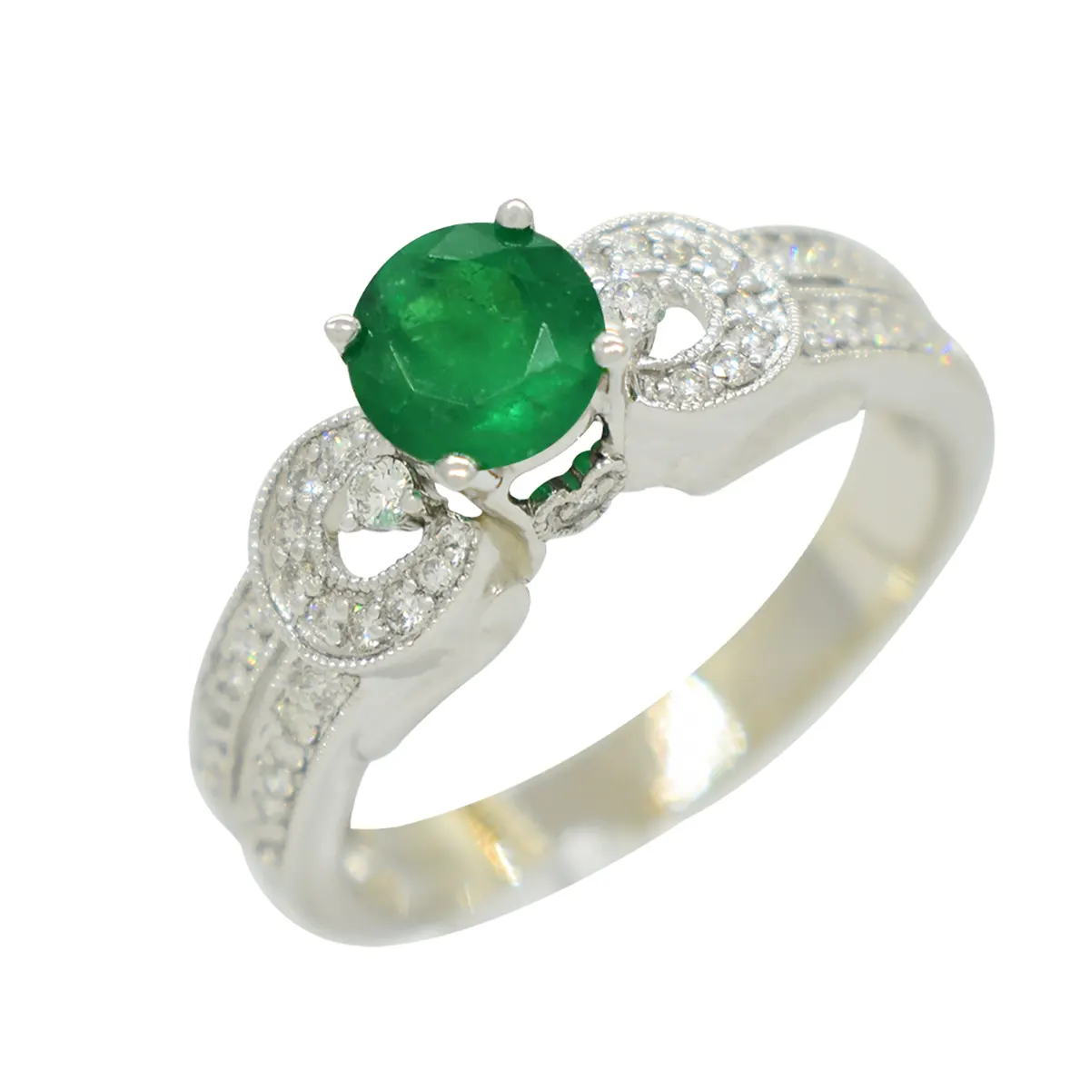 white_gold_emerald_ring_antique_style.webp