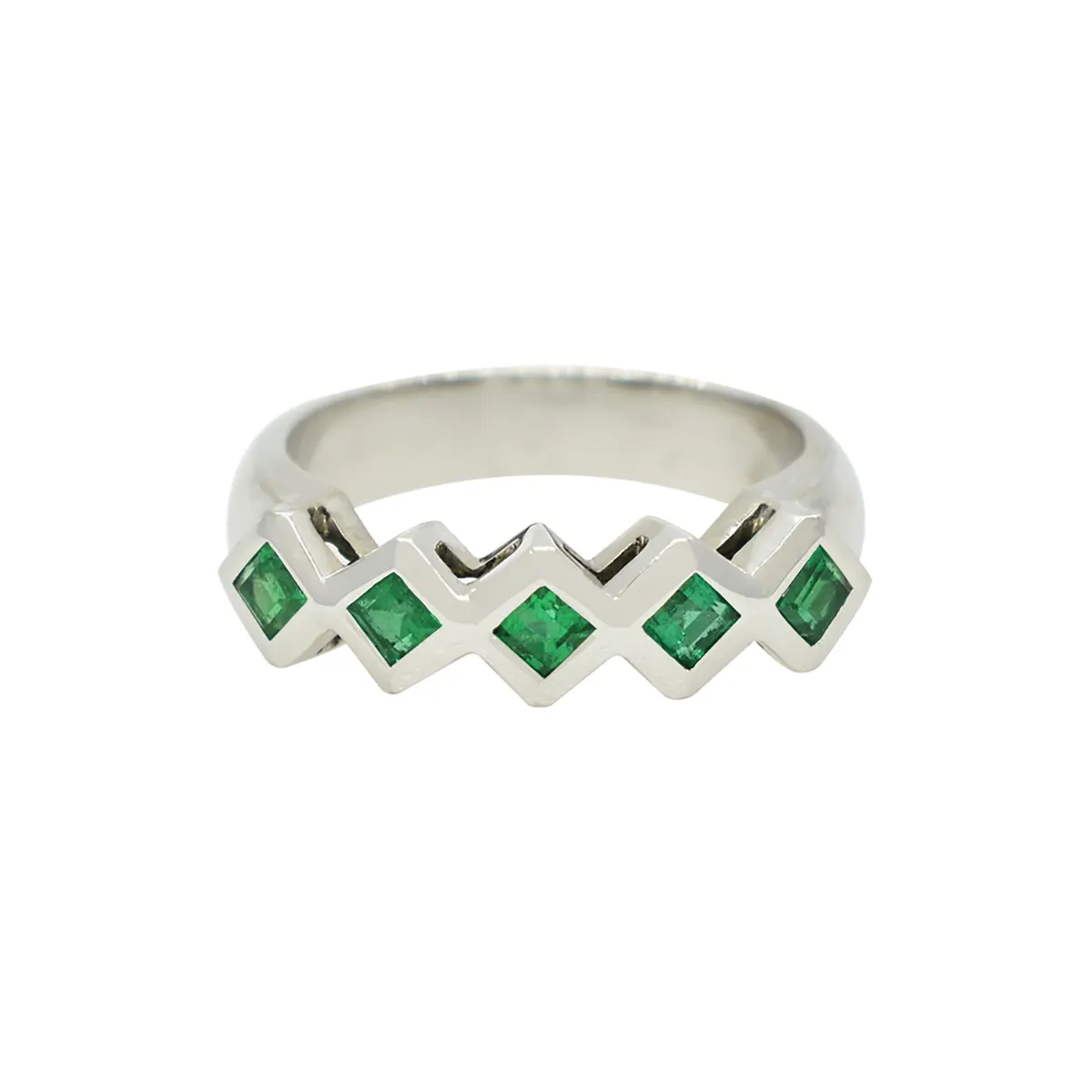 This ring is custom-made and completely handcrafted for this selection of natural emeralds